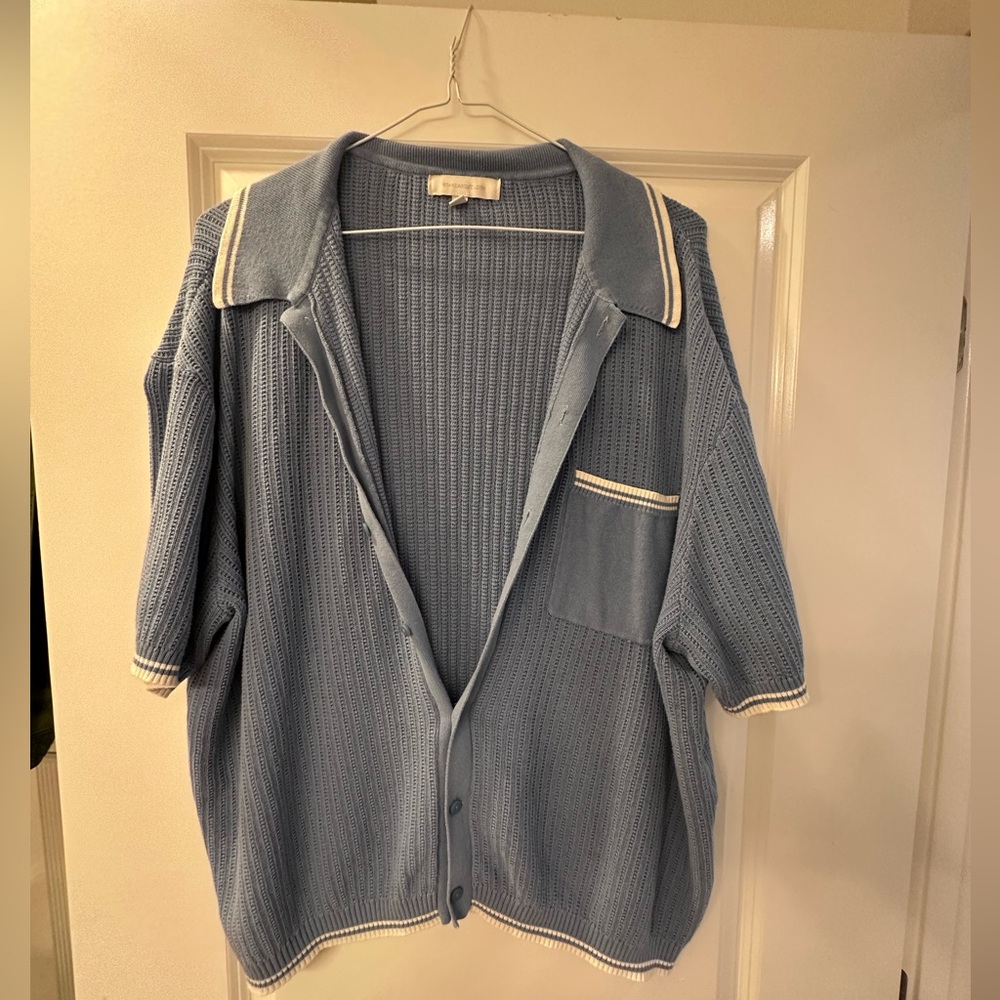 Men’s blue knit polo